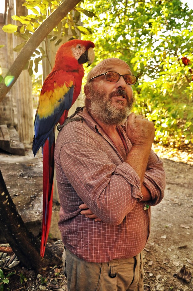 Dick with Chico on his shoulder and Ben in the background